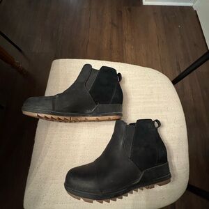 Sorel Evie Wedge Boots in black.